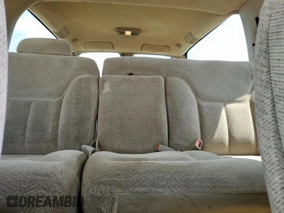 1999 Chevrolet Suburban z VIN 3GNFK16R2XG191868, wystawiony jako Copart lot #57620165 z przebiegiem 128 526 mil mil oraz Szkoda całkowita • Salvage title. Historia ofert i sprzedaży dostępna na DreamBid. Obrazek 10.