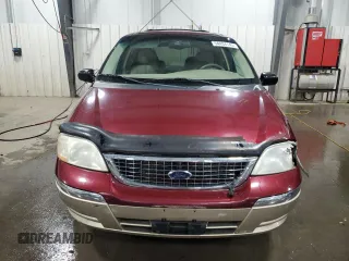 2001 Ford Windstar SEL z VIN 2FMDA56461BB77332, wystawiony jako Copart lot #54434145 z przebiegiem 141 624 mil mil oraz Szkody całkowita. Historia ofert i sprzedaży dostępna na DreamBid. Obrazek 5.