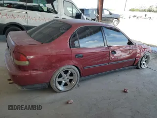 1998 Honda Civic LX with VIN 1HGEJ6676WL018876, listed as a Copart auction lot 55343785 with 167,876 mi miles and Salvage Title. Bid and sale history available at DreamBid. Image 3.