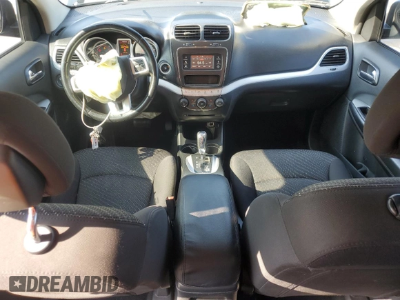 2015 Dodge Journey American Value with VIN 3C4PDCAB1FT583419, listed as a Copart auction lot 55968285 with 253,026 mi miles and Salvage Title. Bid and sale history available at DreamBid. Image 8.