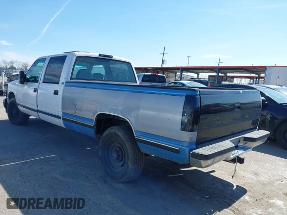 1996 GMC Sierra 1500 with VIN 1GTGC33R4TF018147, listed as a IAAI auction lot 41612770 with 106,443 mi miles and . Bid and sale history available at DreamBid. Image 3.