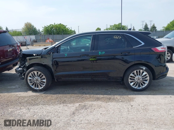 2022 Ford Edge Titanium with VIN 2FMPK4K99NBA12452, listed as a IAAI auction lot 42405627 with 53,015 mi miles and . Bid and sale history available at DreamBid. Image 14.