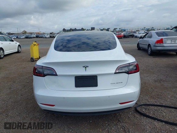 2019 Tesla Model 3 Long Range with VIN 5YJ3E1EBXKF512710, listed as a IAAI auction lot 42063737 with 90,721 mi miles and . Bid and sale history available at DreamBid. Image 17.