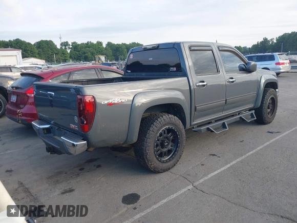 2012 GMC Canyon SLE1 with VIN 1GTH6MFE4C8128579, listed as a IAAI auction lot 42750181 with 250,960 mi miles and . Bid and sale history available at DreamBid. Image 4.