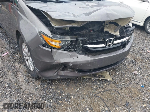 2016 Honda Odyssey EX-L with VIN 5FNRL5H66GB019426, listed as a IAAI auction lot 41939019 with 156,226 mi miles and . Bid and sale history available at DreamBid. Image 6.