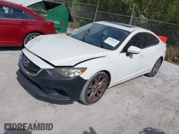2015 Mazda 6 i Grand Touring with VIN JM1GJ1W50F1204322, listed as a IAAI auction lot 40694216 with 141,357 mi miles. Bid and sale history available at carsss.com. Image 2.