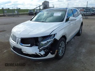 2016 Lincoln MKX Select with VIN 2LMTJ6KR3GBL61112, listed as a IAAI auction lot 42031424 with 130,321 mi miles. Bid and sale history available at carsss.com. Image 2.