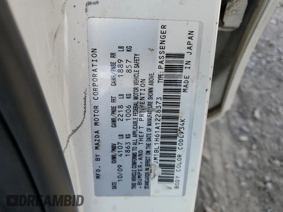 2010 Mazda 3 S Sport z VIN JM1BL1H61A1228373, wystawiony jako Copart lot #56431615 z przebiegiem 221 775 mil mil oraz Szkoda całkowita • Salvage title. Historia ofert i sprzedaży dostępna na DreamBid. Obrazek 13.