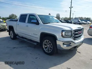 2017 GMC Sierra 1500 SLT with VIN 3GTP1NECXHG423591, listed as a IAAI auction lot 41509177 with 100,071 mi miles and . Bid and sale history available at DreamBid. Image 1.