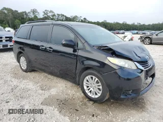 2016 Toyota Sienna XLE with VIN 5TDYK3DC3GS754018, listed as a Copart auction lot 55508925 with 99,016 mi miles and Salvage title. Bid and sale history available at DreamBid. Image 4.