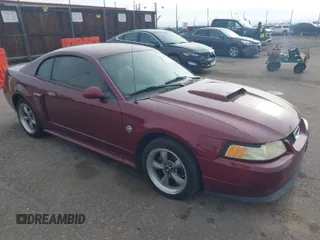 2004 Ford Mustang GT Deluxe z VIN 1FAFP42X64F113421, wystawiony jako IAAI lot #41780758 z przebiegiem Nie podano mil oraz . Historia ofert i sprzedaży dostępna na DreamBid. Obrazek 1.
