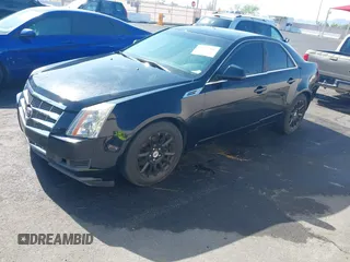 2008 Cadillac CTS RWD z VIN 1G6DF577180143506, wystawiony jako IAAI lot #42422201 z przebiegiem 157 003 mil mil oraz . Historia ofert i sprzedaży dostępna na DreamBid. Obrazek 2.