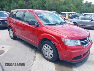 2014 Dodge Journey SE with VIN 3C4PDCABXET258671, listed as a IAAI auction lot 42714929 with 247,599 mi miles and . Bid and sale history available at DreamBid. Image 1.