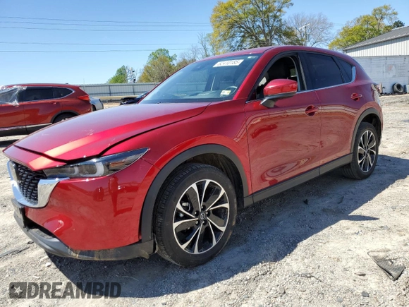 2023 Mazda CX-5 2.5 S Premium Plus Package with VIN JM3KFBEM0P0163618, listed as a Copart auction lot 52410185 with 31,909 mi miles and Salvage Title. Bid and sale history available at carsss.com. Image 1.