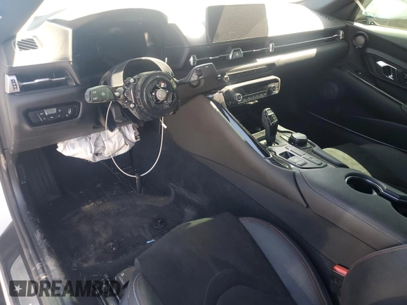 2021 Toyota Supra 2.0 with VIN WZ1DB2C04MW039858, listed as a Copart auction lot 70049874 with 10,586 mi miles and Salvage title. Bid and sale history available at DreamBid. Image 8.