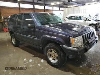 1997 Jeep Grand Cherokee Laredo with VIN 1J4GZ58Y7VC678708, listed as a Copart auction lot 87803725 with 312,585 mi miles and Salvage Title. Bid and sale history available at carsss.com. Image 4.