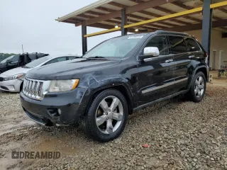 2011 Jeep Grand Cherokee Overland Summit with VIN 1J4RR6GT0BC607835, listed as a Copart auction lot 61490915 with 173,600 mi miles and Salvage title. Bid and sale history available at DreamBid. Image 1.