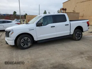 2023 Ford F-150 Lightning Pro z VIN 1FTVW1ELXPWG63466, wystawiony jako Copart lot #43397005 z przebiegiem 8 852 mil mil oraz Szkoda całkowita • Salvage title. Historia ofert i sprzedaży dostępna na DreamBid. Obrazek 1.