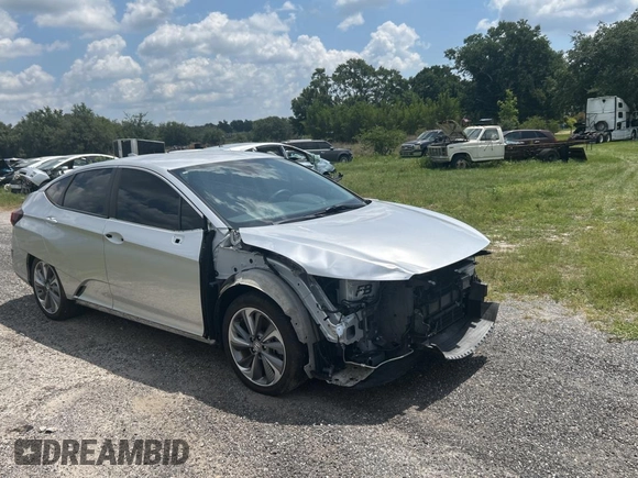 2019 Honda Clarity z VIN JHMZC5F14KC002619, wystawiony jako Copart lot #58252705 z przebiegiem 53 911 mil mil oraz Szkoda całkowita • Salvage title. Historia ofert i sprzedaży dostępna na DreamBid. Obrazek 1.