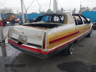 1993 Cadillac Fleetwood z VIN 1G6DW5276PR720371, wystawiony jako IAAI lot #41729298 z przebiegiem Nie podano mil oraz . Historia ofert i sprzedaży dostępna na DreamBid. Obrazek 4.