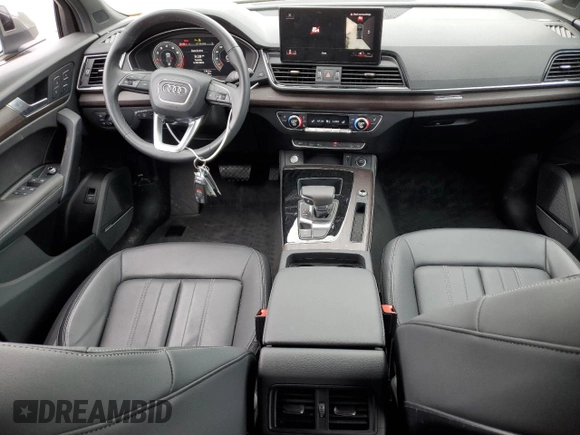 2023 Audi Q5 S line Premium Plus z VIN WA1EAAFY3P2183215, wystawiony jako Copart lot #57240255 z przebiegiem 13 998 mil mil oraz Szkody całkowita. Historia ofert i sprzedaży dostępna na DreamBid. Obrazek 8.
