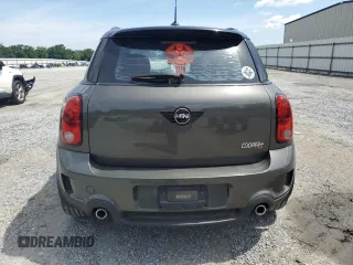 2012 MINI Countryman S with VIN WMWZC5C5XCWL56232, listed as a Copart auction lot 60298705 with 140,425 mi miles and Salvage title. Bid and sale history available at DreamBid. Image 6.