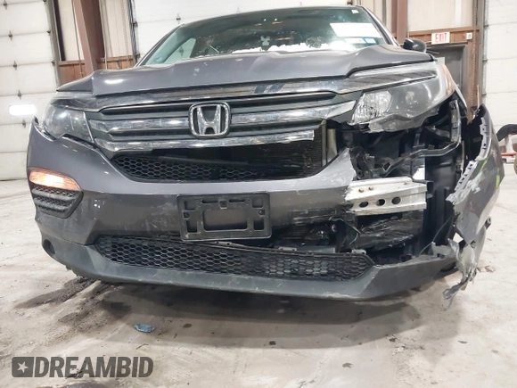 2016 Honda Pilot LX with VIN 5FNYF6H1XGB111488, listed as a IAAI auction lot 41581706 with 100,028 mi miles. Bid and sale history available at carsss.com. Image 6.