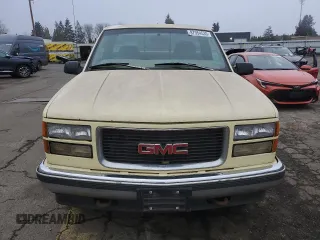 1997 GMC Sierra 1500 with VIN 1GTGC24R4VZ546832, listed as a Copart auction lot 87954535 with 411,941 mi miles and Clean Title. Bid and sale history available at DreamBid. Image 5.