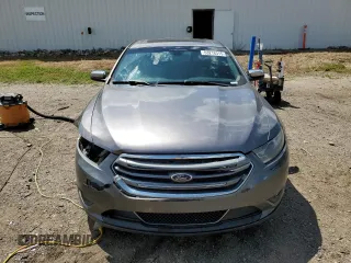 2013 Ford Taurus Limited z VIN 1FAHP2F81DG229944, wystawiony jako Copart lot #63218315 z przebiegiem 199 897 mil mil oraz Czysty tytuł • Clean title. Historia ofert i sprzedaży dostępna na DreamBid. Obrazek 5.