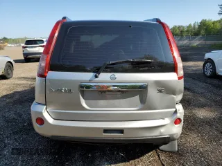 2006 Nissan X-Trail XE z VIN JN8BT08V76W200772, wystawiony jako Copart lot #62078634 z przebiegiem 234 102 mil mil oraz Szkody całkowita. Historia ofert i sprzedaży dostępna na DreamBid. Obrazek 6.
