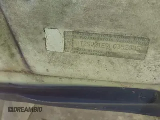 1990 Toyota Camry z VIN JT2SV21E9L0352085, wystawiony jako IAAI lot #42419588 z przebiegiem 138 425 mil mil oraz . Historia ofert i sprzedaży dostępna na DreamBid. Obrazek 9.