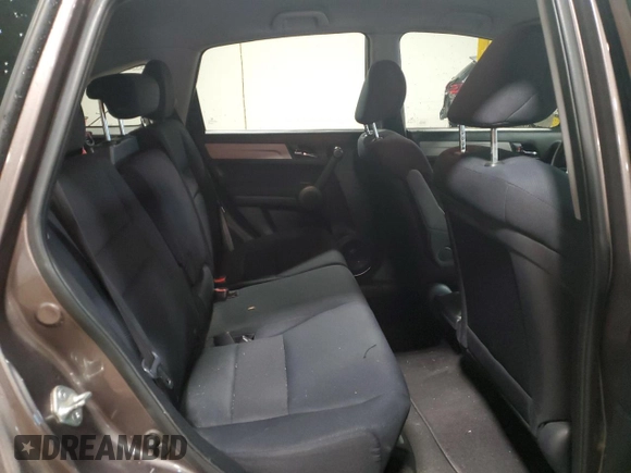 2010 Honda CR-V LX z VIN 5J6RE4H3XAL095434, wystawiony jako Copart lot #55614855 z przebiegiem 157 867 mil mil oraz Szkoda całkowita • Salvage title. Historia ofert i sprzedaży dostępna na DreamBid. Obrazek 11.