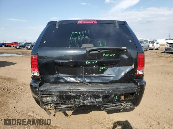 2008 Jeep Grand Cherokee SRT-8 with VIN 1J8HR78308C174606, listed as a Copart auction lot 70313584 with 169,765 mi miles and Salvage Title. Bid and sale history available at carsss.com. Image 6.