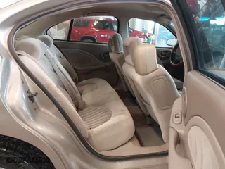 2002 Pontiac Bonneville SE with VIN 1G2HX54K424128538, listed as a IAAI auction lot 41606130 with 147,048 mi miles. Bid and sale history available at carsss.com. Image 8.