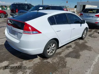 2010 Honda Insight EX with VIN JHMZE2H78AS016537, listed as a IAAI auction lot 42199484 with 273,061 mi miles and . Bid and sale history available at DreamBid. Image 4.