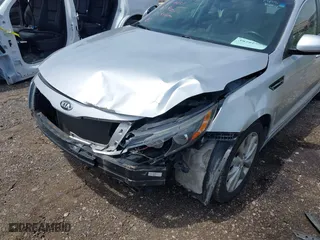2014 Kia Optima EX with VIN 5XXGN4A79EG339431, listed as a IAAI auction lot 39792297 with 101,446 mi miles. Bid and sale history available at carsss.com. Image 6.