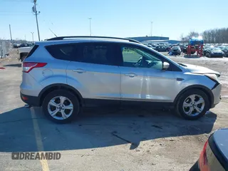 2014 Ford Escape SE with VIN 1FMCU0GX6EUE34729, listed as a IAAI auction lot 41879689 with 167,600 mi miles and . Bid and sale history available at DreamBid. Image 13.