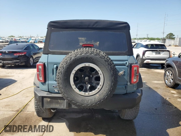 2022 Ford Bronco with VIN 1FMEE5DP3NLB62749, listed as a Copart auction lot 52227435 with 59,444 mi miles and Salvage Title. Bid and sale history available at DreamBid. Image 6.