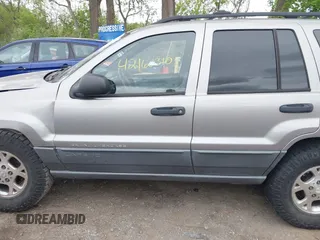 2001 Jeep Grand Cherokee Laredo z VIN 1J4GW48S01C658017, wystawiony jako IAAI lot #42160310 z przebiegiem 220 309 mil mil oraz . Historia ofert i sprzedaży dostępna na DreamBid. Obrazek 15.