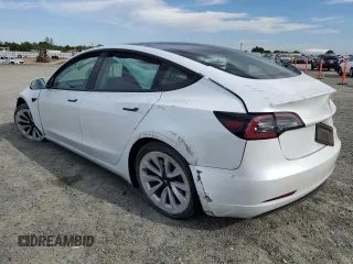 2021 Tesla Model 3 Long Range with VIN 5YJ3E1EB7MF874304, listed as a Copart auction lot 52652825 with Not Provided miles and Salvage Title. Bid and sale history available at carsss.com. Image 2.