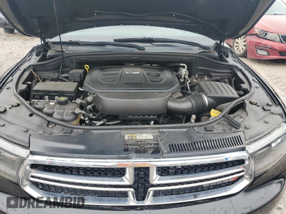 2016 Dodge Durango SXT z VIN 1C4RDJAGXGC354100, wystawiony jako Copart lot #53970915 z przebiegiem 168 945 mil mil oraz Czysty tytuł • Clean title. Historia ofert i sprzedaży dostępna na DreamBid. Obrazek 12.