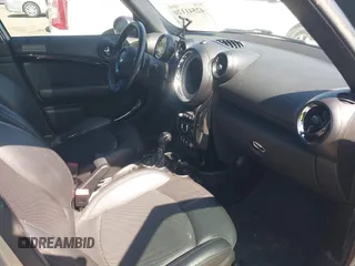 2014 MINI Countryman S with VIN WMWZC5C52EWP36667, listed as a IAAI auction lot 42541120 with 149,331 mi miles and . Bid and sale history available at DreamBid. Image 5.