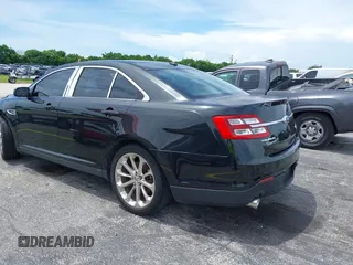 2013 Ford Taurus Limited with VIN 1FAHP2F84DG220283, listed as a IAAI auction lot 40045974 with 155,409 mi miles and . Bid and sale history available at DreamBid. Image 14.