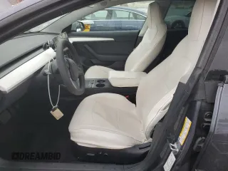 2023 Tesla Model 3 with VIN 5YJ3E1EA5PF640805, listed as a Copart auction lot 48389265 with 28,193 mi miles and Salvage title. Bid and sale history available at DreamBid. Image 7.