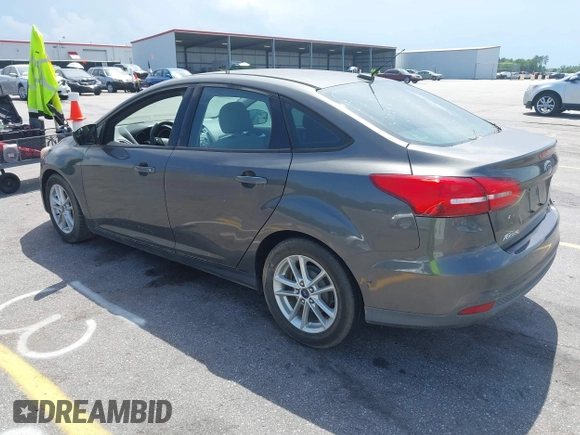 2016 Ford Focus SE with VIN 1FADP3F26GL207417, listed as a IAAI auction lot 42107442 with 116,700 mi miles. Bid and sale history available at carsss.com. Image 3.