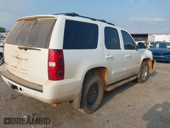 2014 Chevrolet Tahoe LT with VIN 1GNSKBE01ER240904, listed as a IAAI auction lot 42277461 with 176,745 mi miles and . Bid and sale history available at DreamBid. Image 4.