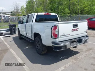 2019 GMC Canyon 4WD SLE z VIN 1GTG6CENXK1319647, wystawiony jako IAAI lot #42039568 z przebiegiem 56 371 mil mil oraz . Historia ofert i sprzedaży dostępna na DreamBid. Obrazek 3.