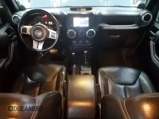 2013 Jeep Wrangler Unlimited Rubicon with VIN 1C4BJWFG7DL691514, listed as a Copart auction lot 42449245 with 114,640 mi miles and Salvage Title. Bid and sale history available at carsss.com. Image 8.