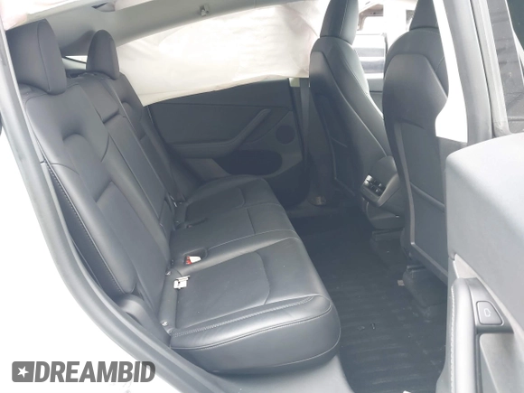 2022 Tesla Model Y Long Range with VIN 7SAYGDEE3NF518061, listed as a IAAI auction lot 41896233 with 34,714 mi miles and . Bid and sale history available at carsss.com. Image 8.