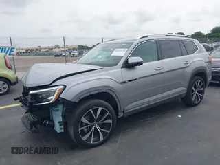 2024 Volkswagen Atlas SEL Premium R-Line with VIN 1V2FR2CA7RC595004, listed as a IAAI auction lot 42425330 with 16,171 mi miles and . Bid and sale history available at DreamBid. Image 2.